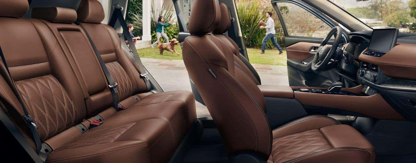 Brown leather seats in a 2026.5 Nissan Rogue Platinum AWD.