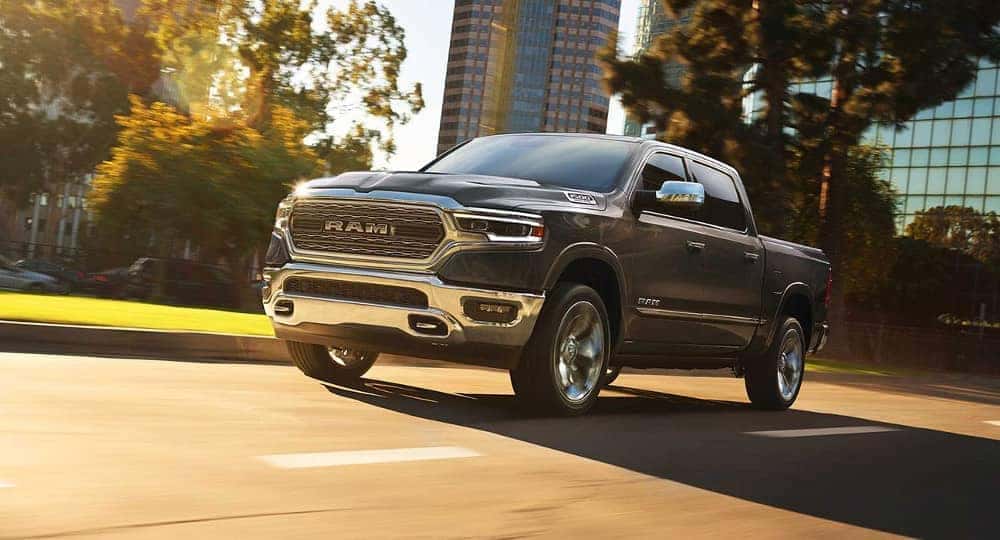 2019 Ram 1500 drives down city street
