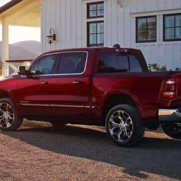 2019 Ram 1500 parked next to home