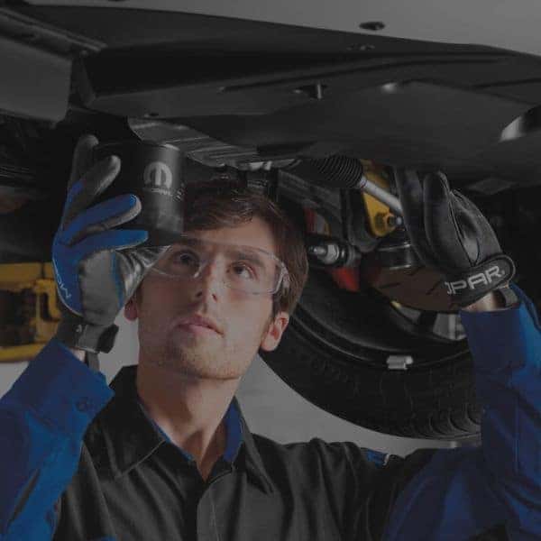 Person holding a wheel rim.