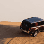 A Defender SUV shows off its capability