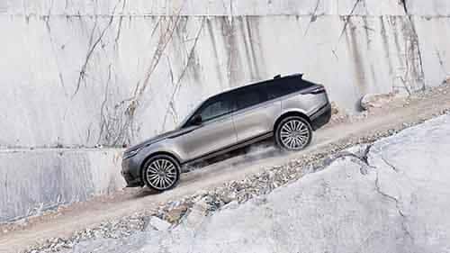 2018 Land Rover Range Rover Velar driving down dirt hill
