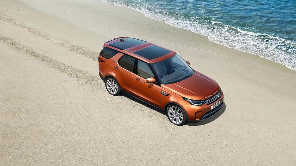2019 Land Rover Discovery Driving on a Beach