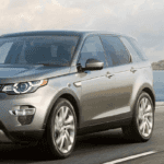2019 Land Rover Discovery Sport SUV driving on coastal road