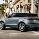The 2021 Range Rover Evoque making a turn in a city.