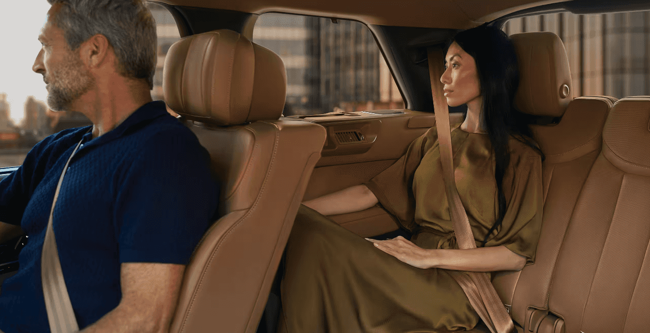Passengers show in the front seat and rear seat of the 2024 Range Rover
