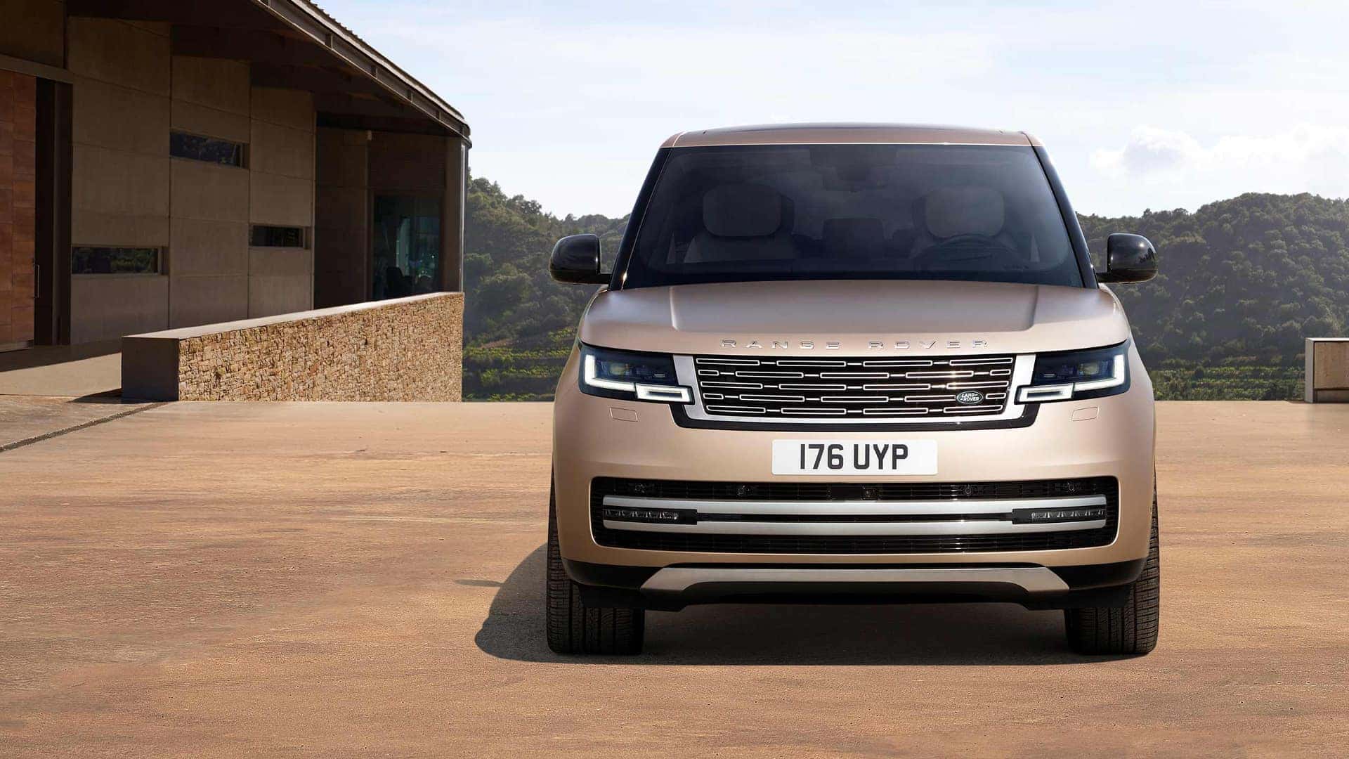 A parked brown 2025 Range Rover