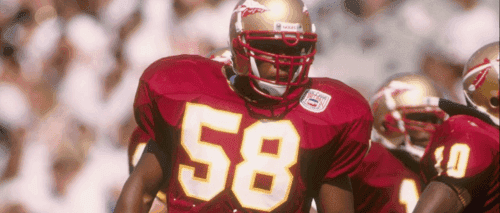 Peter Boulware playing football