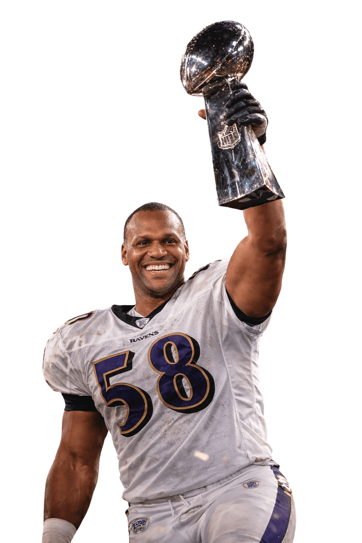 Peter Boulware holding the Super Bowl trophy