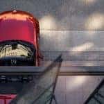 A red 2022 Mazda MX-5 Miata is shown from a high angle after leaving a Chapin Mazda dealer.