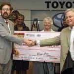 Palmer’s Toyota giving donation check to Child Advocacy Center