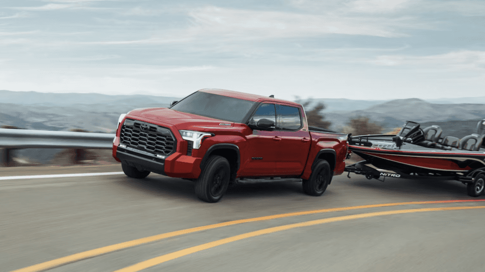 2025 Toyota Tundra shown in Supersonic Red* for sale at Palmer's Toyota near me in Pensacola, FL.