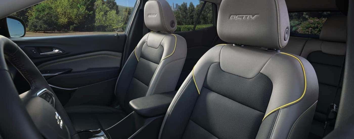 They grey and black interior is shown in a 2024 Chevy Trax ACTIV.