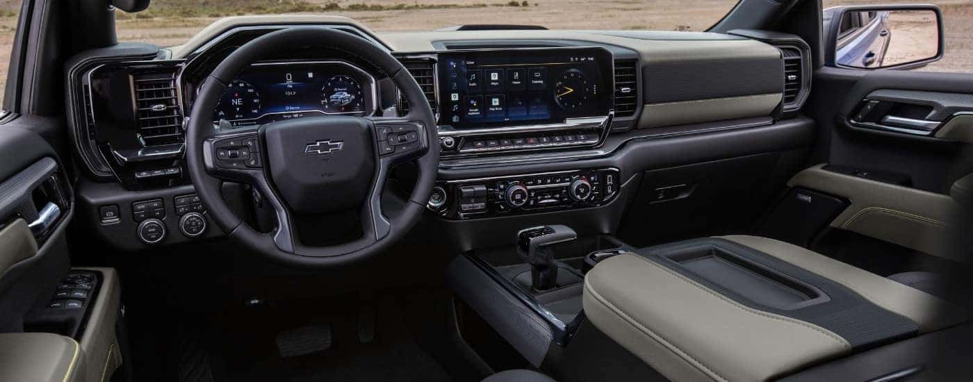 The black and grey interior in a 2023 Chevy Silverado 1500 ZR2.