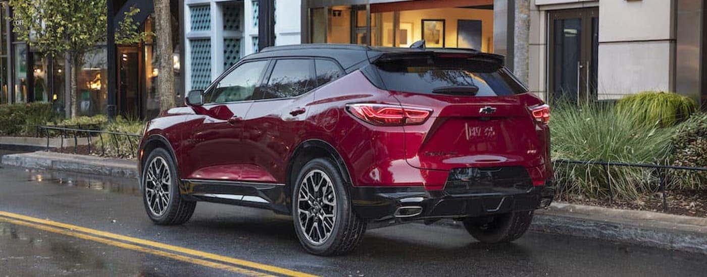 A red 2023 Chevy Blazer from the rear.
