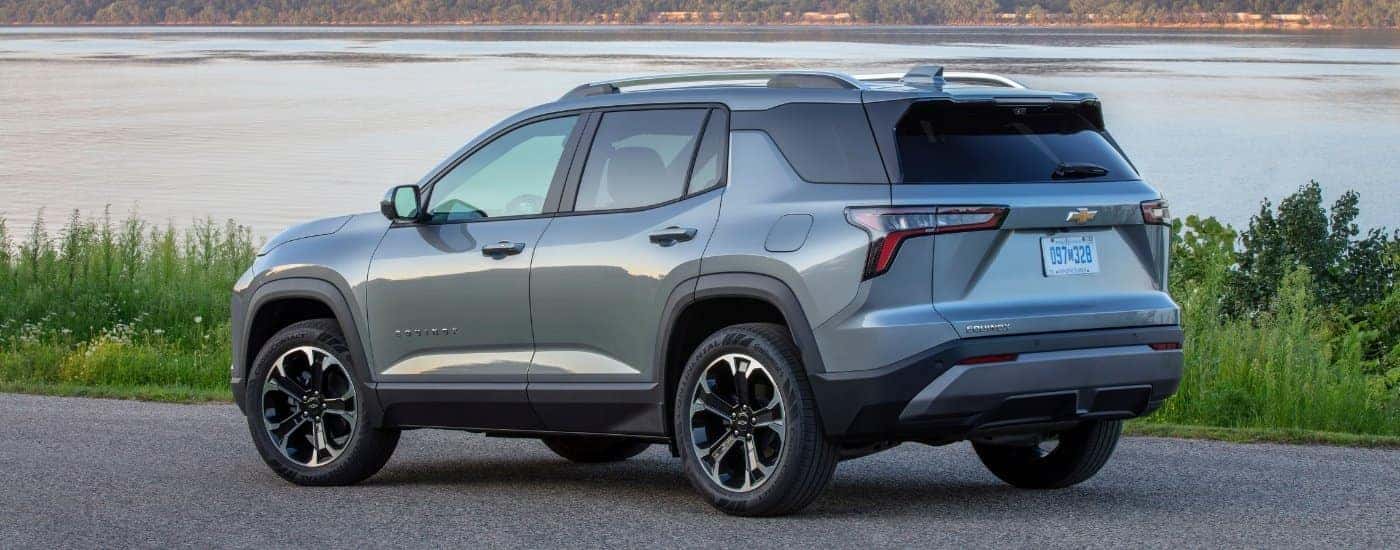 A grey 2025 Chevy Equinox for sale near Cherryville from the rear at an angle.