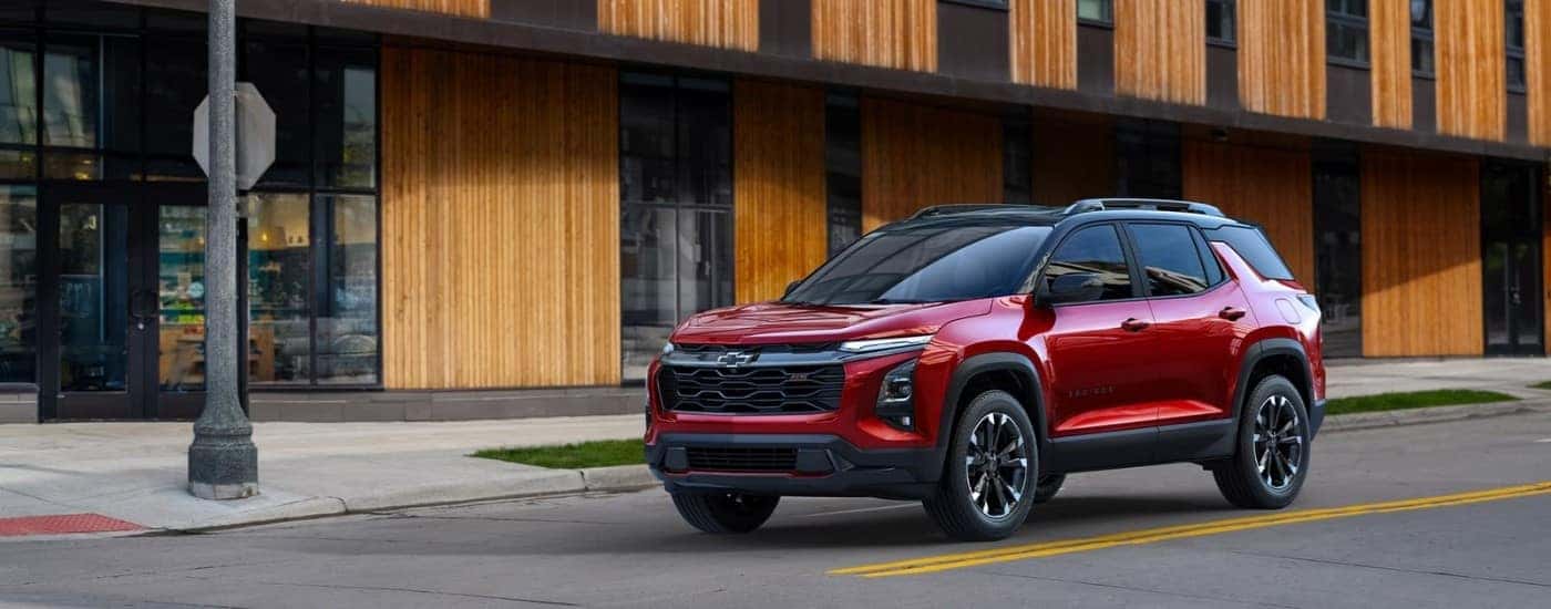 A red 2025 Chevy Equinox for sale near me from the front.