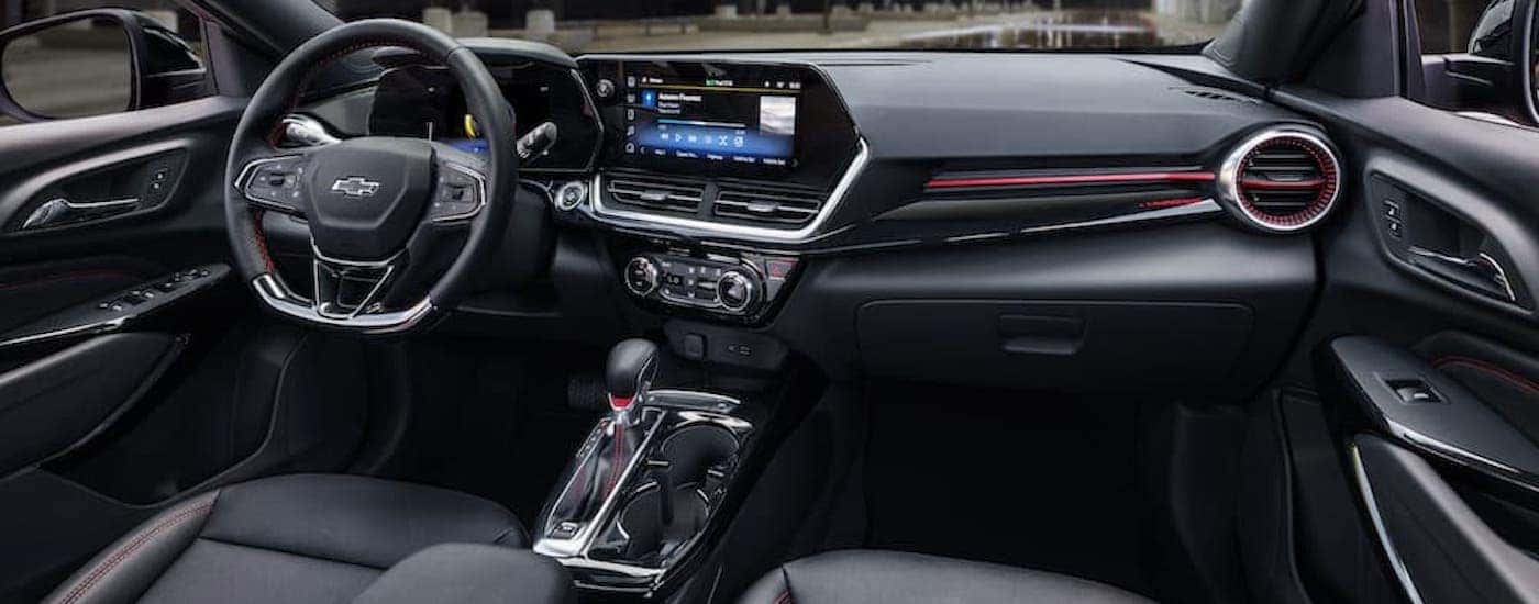 The black interior of a 2025 Chevy Trax.