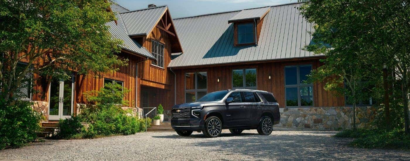 A grey 2025 Chevy Tahoe for sale near Denver from the front.