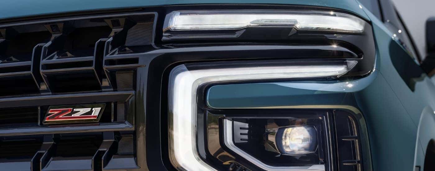 The front of a green 2025 Chevy Tahoe.