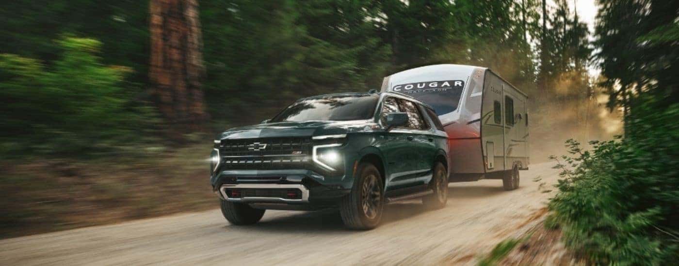 A green 2025 Chevy Tahoe for sale near Statesville from the front.