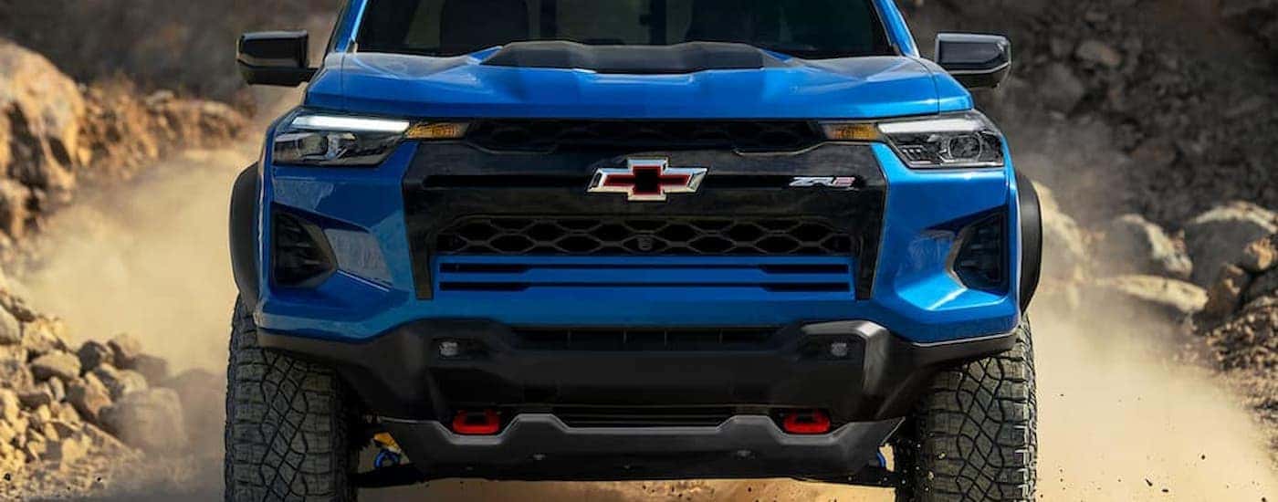 A blue 2025 Chevy Colorado ZR2 off-roading for sale in Huntersville