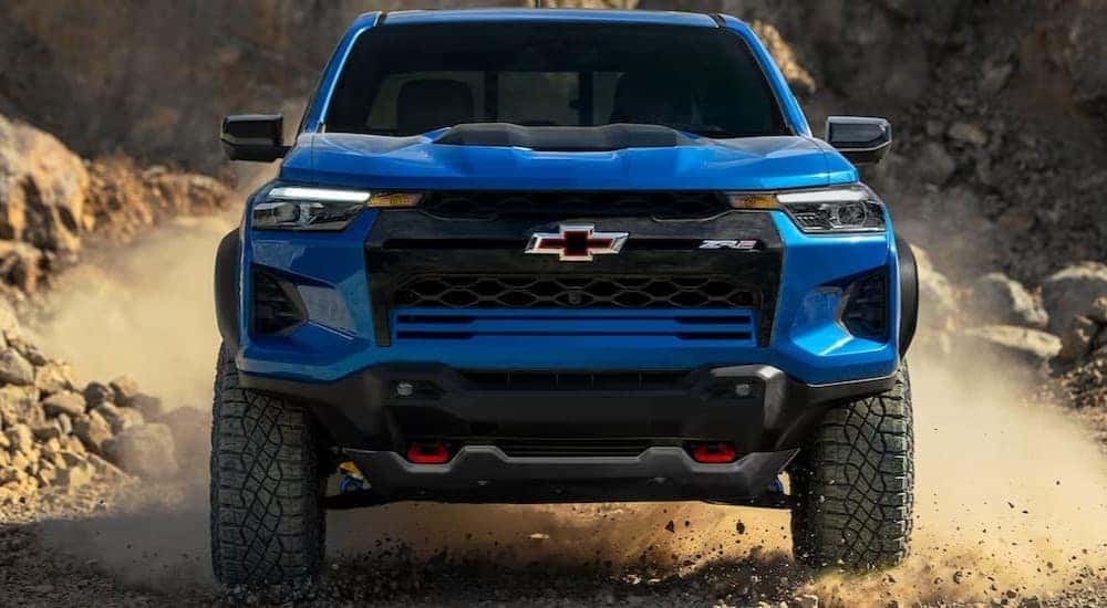 A blue 2025 Chevy Colorado ZR2 off-roading.