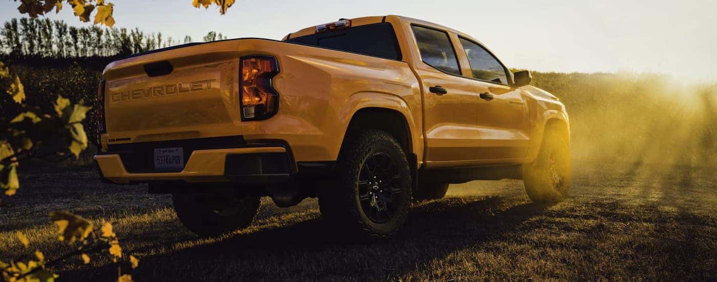 A yellow 2026 Chevy Colorado parked off-road for sale near Cornelius
