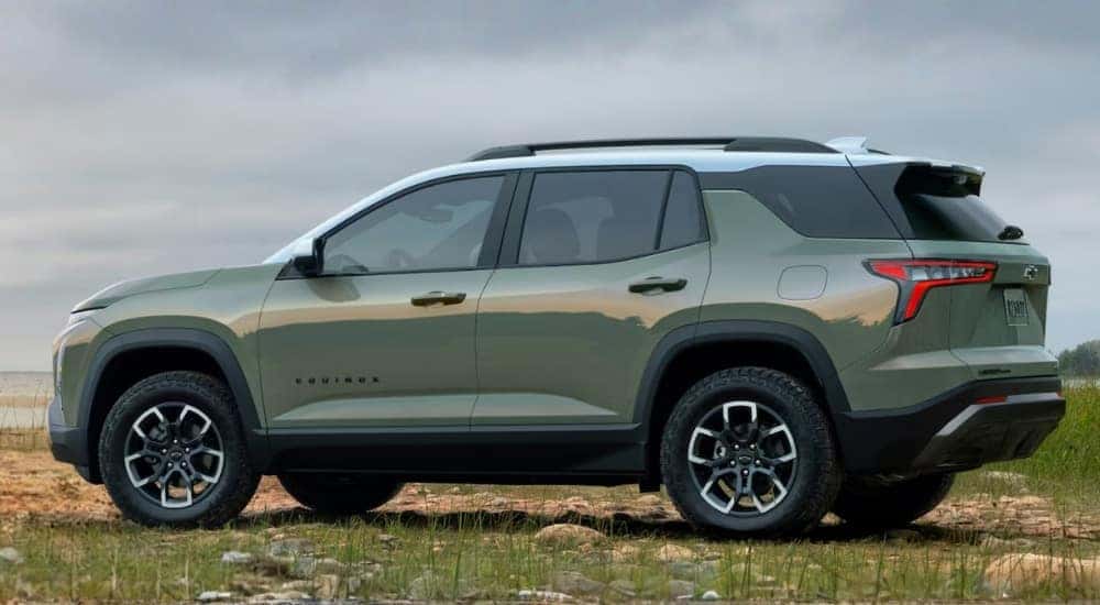 Green 2026 Chevy Equinox ACTIV parked off-road