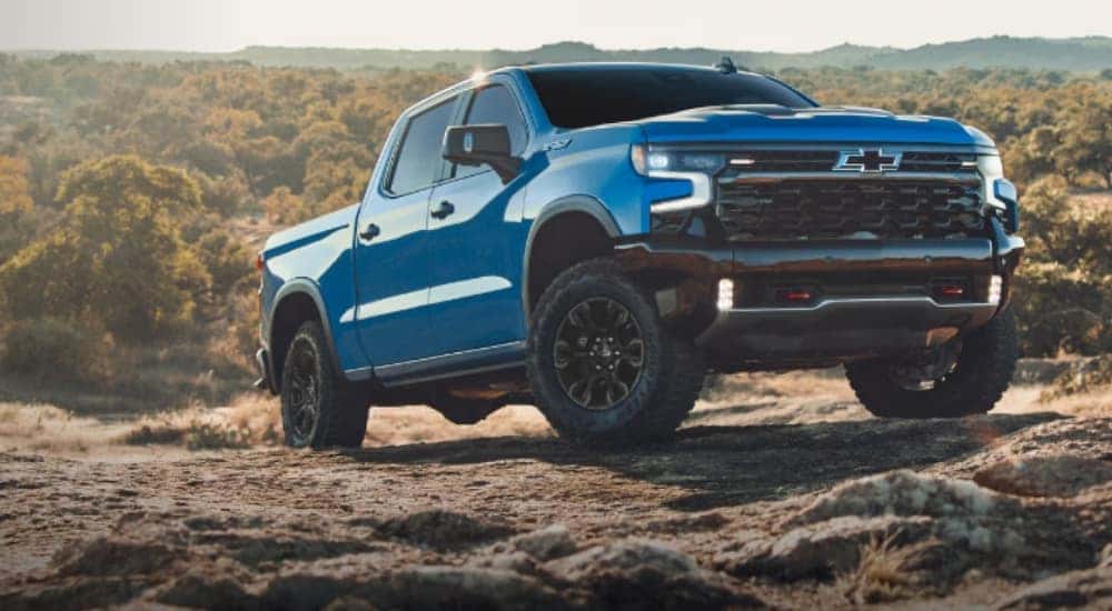 Blue 2026 Chevy Silverado 1500 ZR2 parked off-road