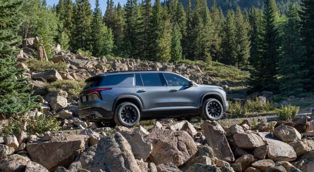 A grey 2026 Chevy Traverse Z71 on a trail