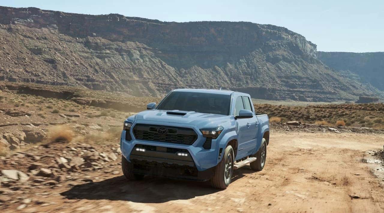 2026 Toyota Tacoma TRD Sport shown in Heritage Blue with available side step accessory for sale in Opelousas, LA