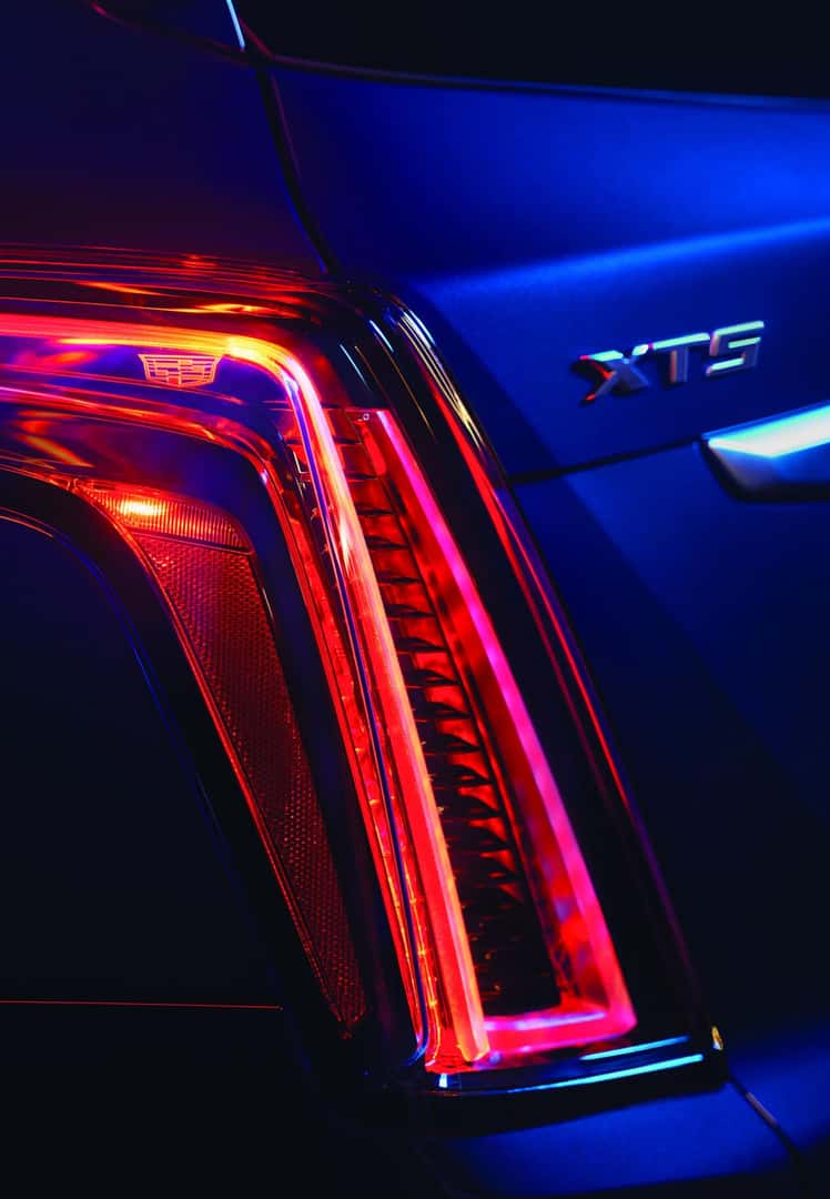Close up of 2025 Quantrell Cadillac Taillight in a dark setting
