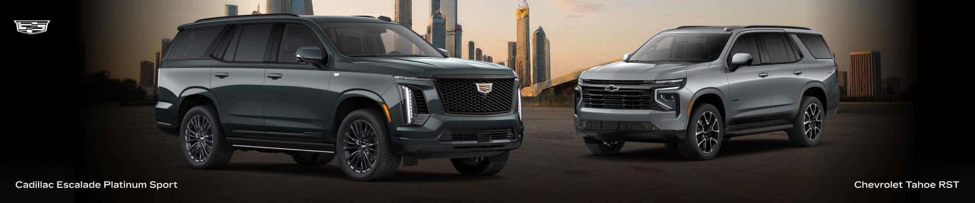 2026 Cadillac Escalade Platinum Sport in Aegean Stone and Chevrolet Tahoe RST in Sterling Gray Metallic by a city skyline.