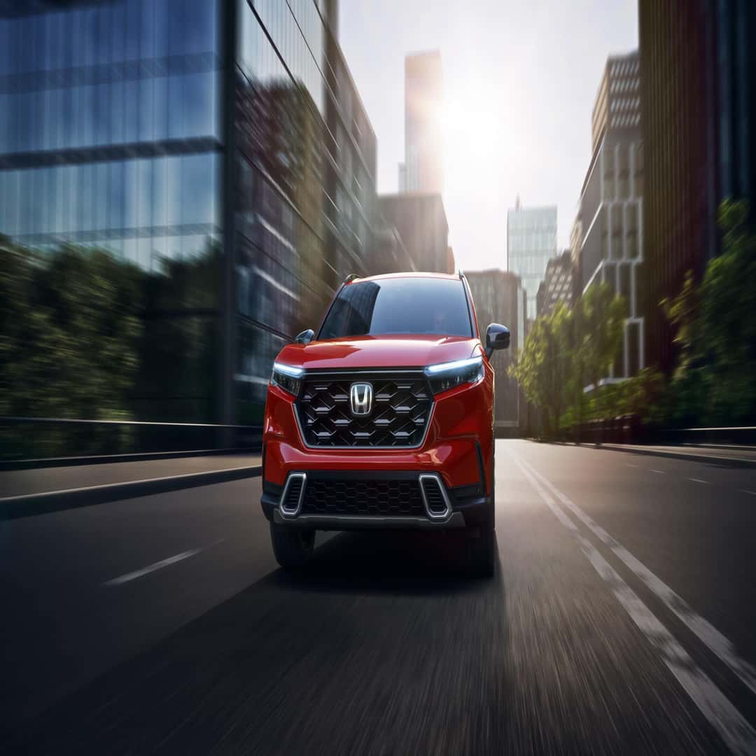 A front facing red Honda CRV