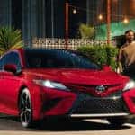 Red 2019 Toyota Camry parked curbside