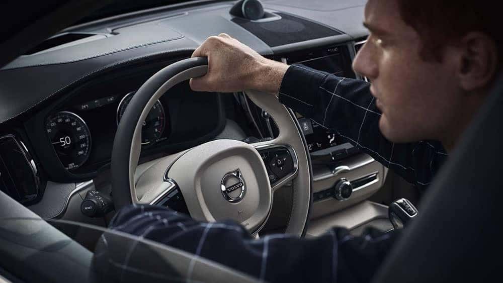 driver behind the wheel of 2019 Volvo XC60