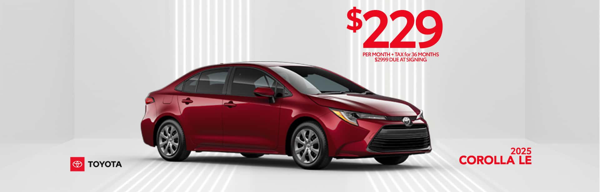 deep red compact sedan on gray background