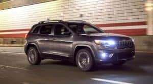 A grey 2021 Jeep Cherokee High Altitude is driving through a tunnel after leaving an Ohio Jeep dealer.