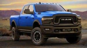 A blue 2022 Ram 2500 is shown from the front after leaving a Ram 2500 dealership.