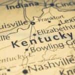 A close up shows a map of Kentucky.