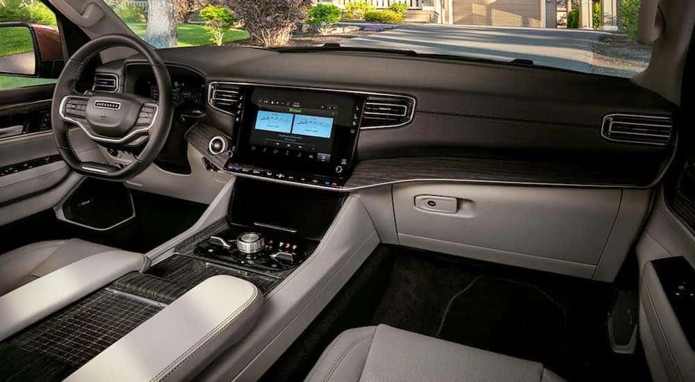 The interior of a 2023 Wagoneer L is shown from the passenger seat.