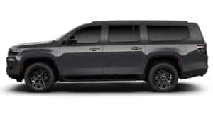 A dark grey 2023 Wagoneer L is facing left.