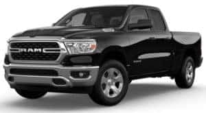 A black 2023 Ram 1500 is shown angled left.