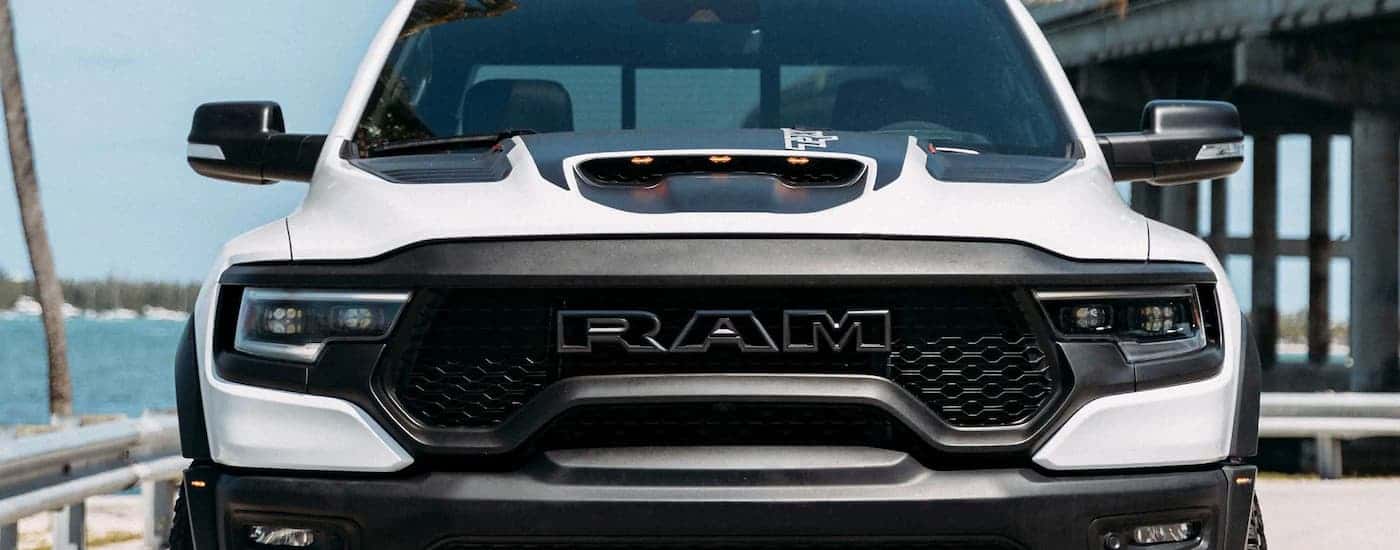A white 2022 Ram 1500 TRX is shown from the front after viewing Ram trucks for sale.