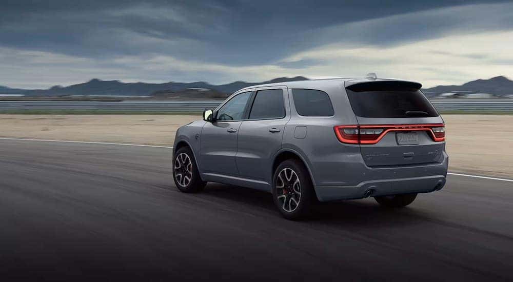 A grey 2022 Dodge Durango SRT Hellcat is shown from the rear at an angle.