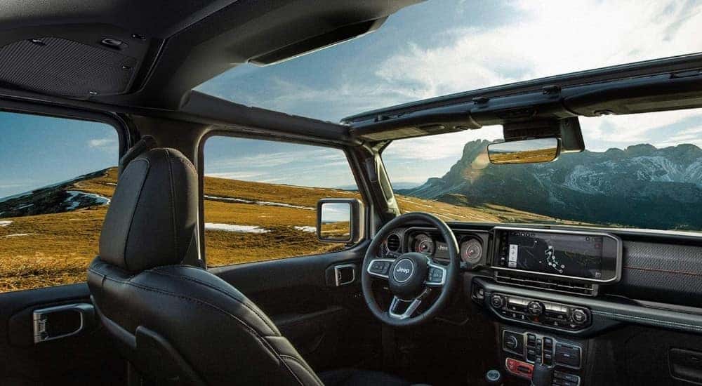The black interior is shown in a 2025 Jeep Wrangler for sale in Florence.