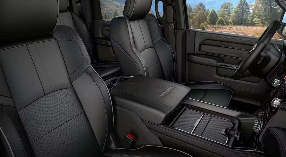 The black interior is shown in a 2024 Ram 2500 Limited