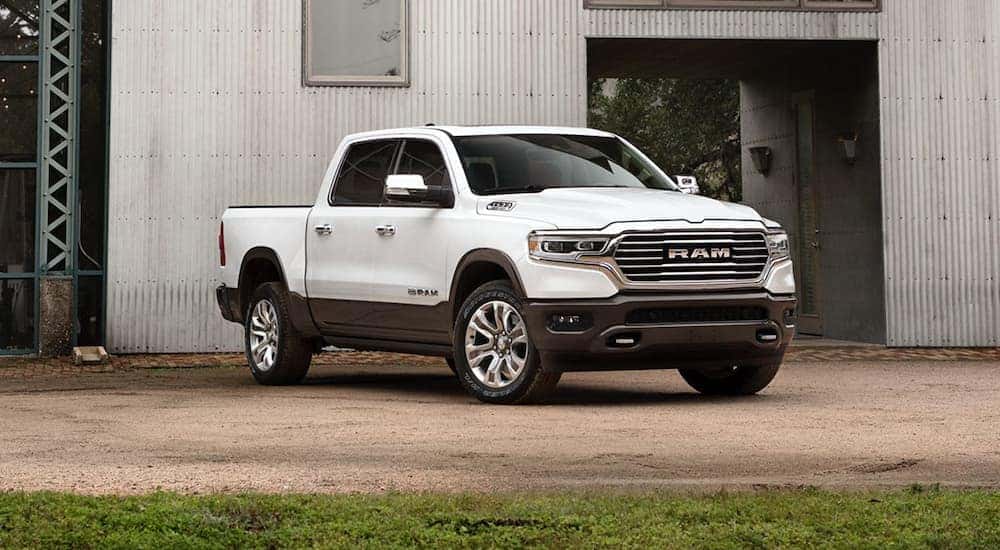 A white 2020 Ram 1500 is shown from the front at an angle.