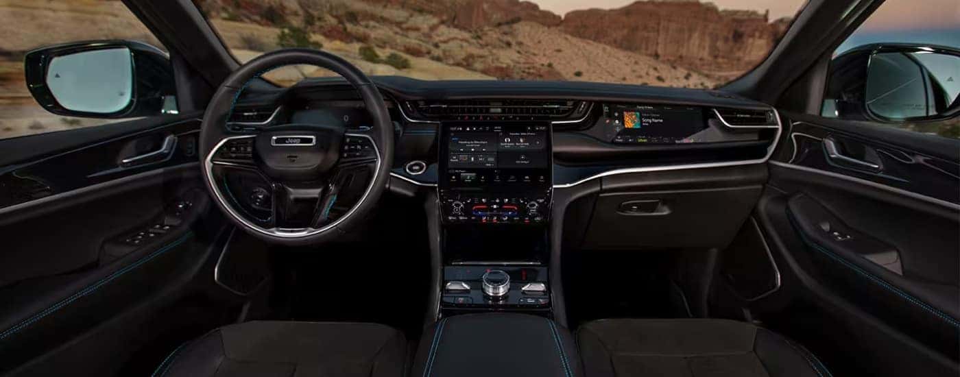 The black dash of a 2025 Jeep Grand Cherokee L is shown.